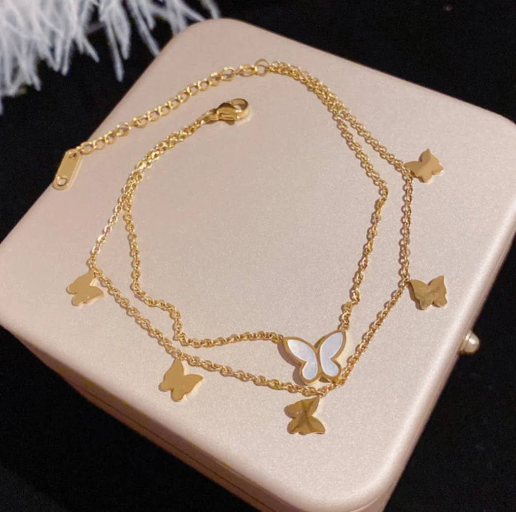Butterfly charm layered anklets